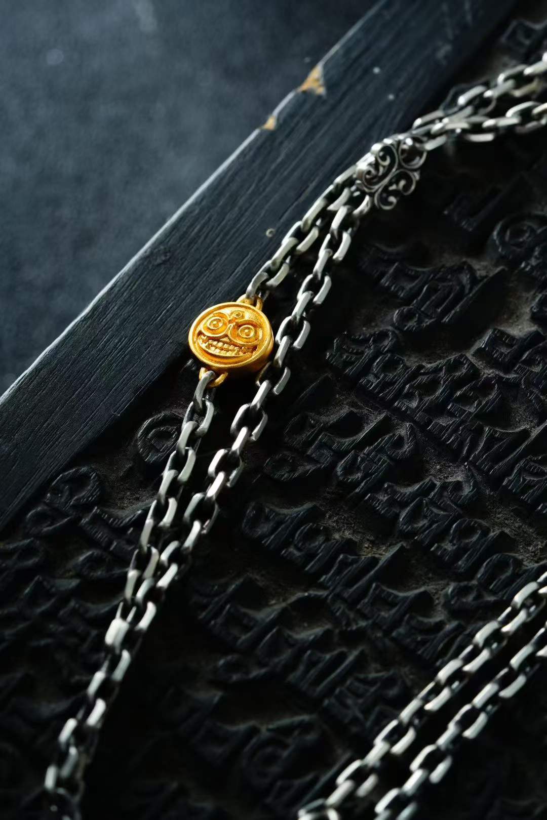 Silver charm — detail view 2