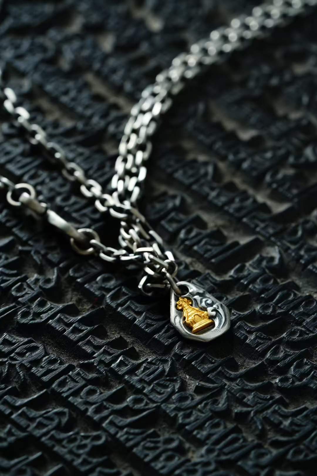 Silver charm — detail view 3