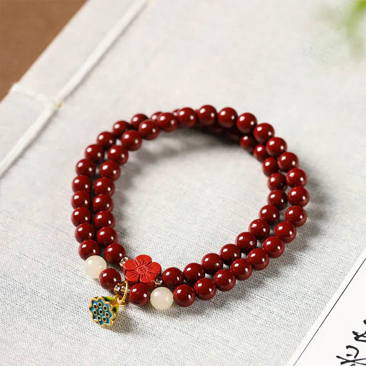 Wrapped in Light – Cinnabar & Lotus Protection Bracelet — handmade Tibetan bracelet