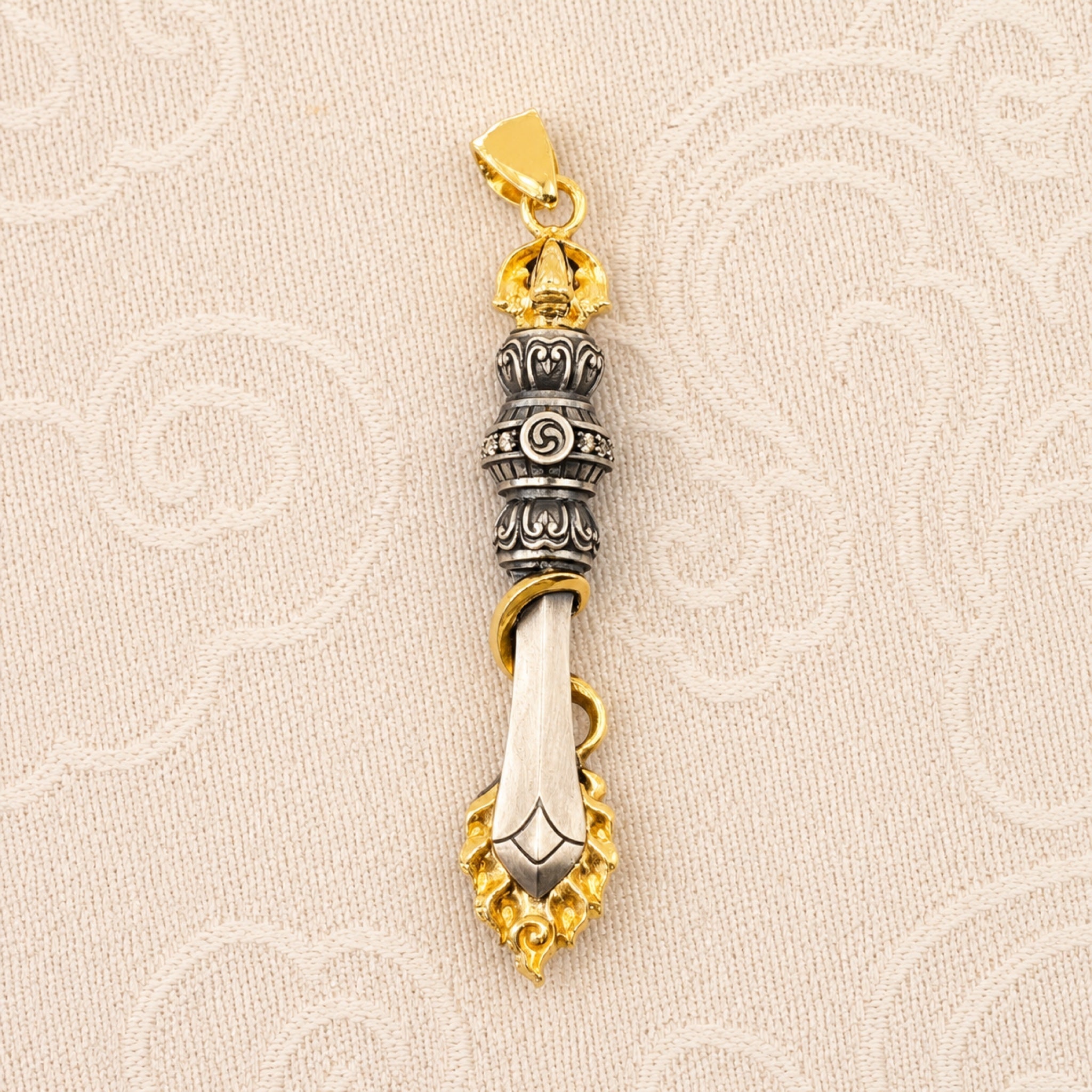 Manjushri sword pendant — detail view 2