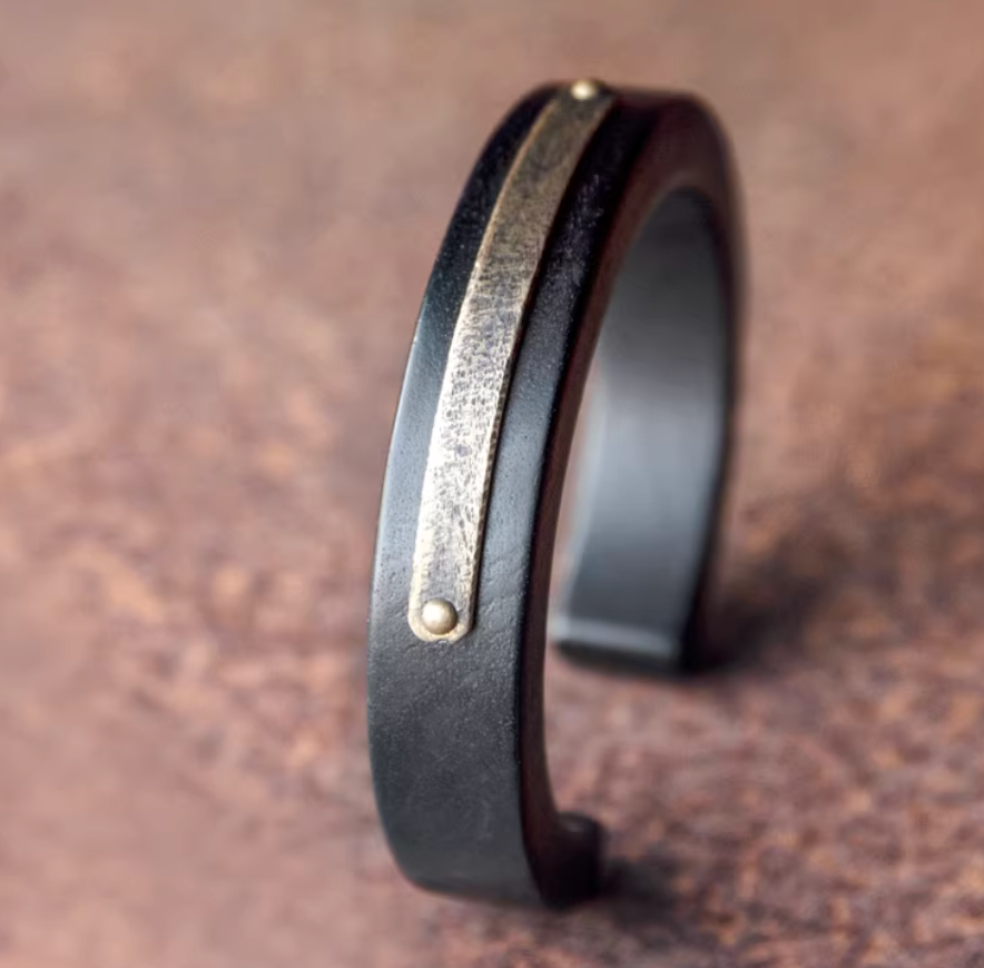 Brass charm — detail view 2