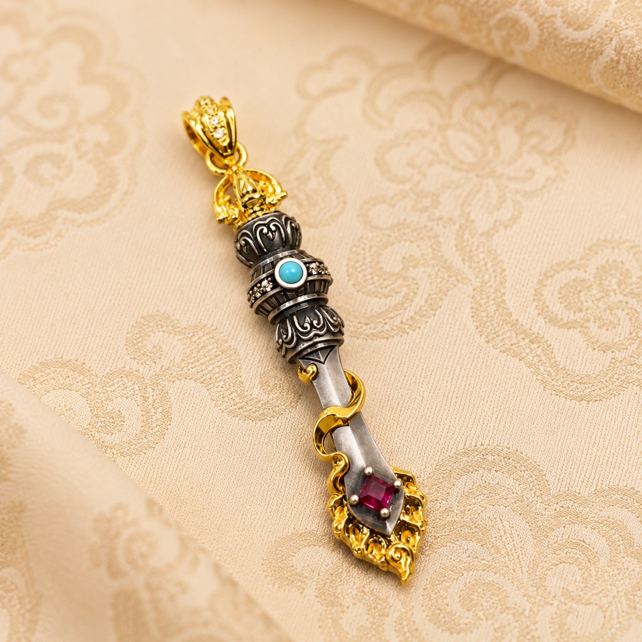 Manjushri Sword Pendant — Gilt Copper, Turquoise & Red Crystal — front view