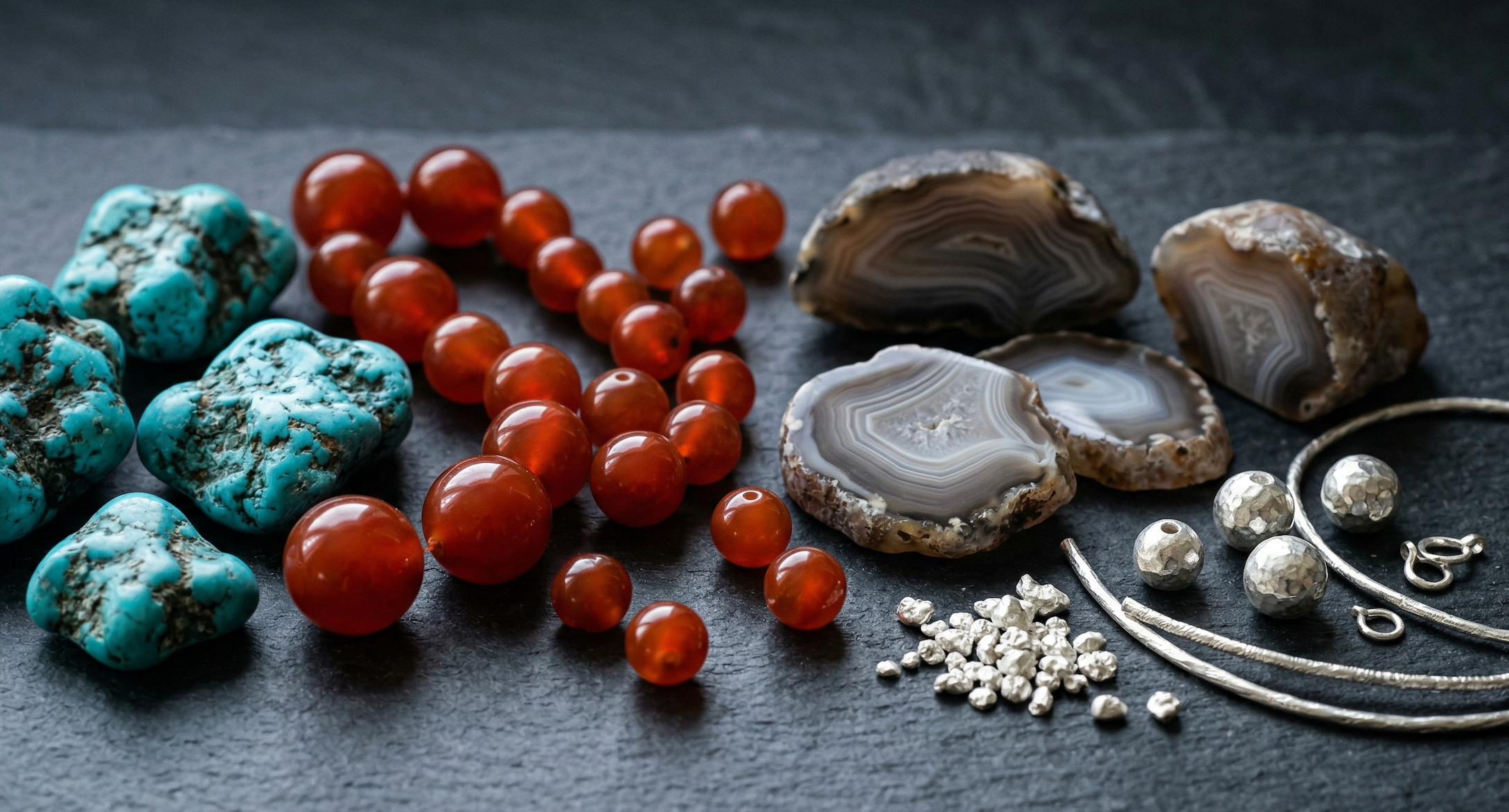 Tibetan jewelry materials: turquoise stones, nanhong beads, agate slices, and silver components